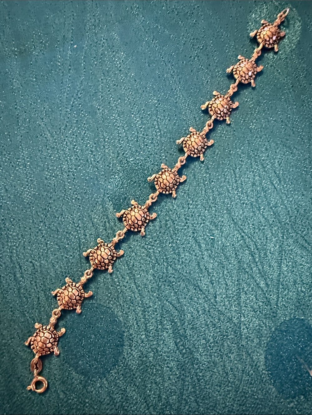 Turtle Link Charm Bracelet in Sterling silver